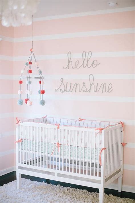 A cute bedroom in pink that certainly is for a little lady or a grownup who love cuddly and soft stuffs. White and Pink Striped Nursery Walls - Transitional - Nursery