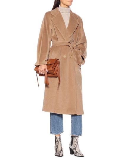 You really and truly don't have to spend a ton of money to look like you dropped $1k on an outfit. Camel coats: the outerwear that makes every outfit look chicer