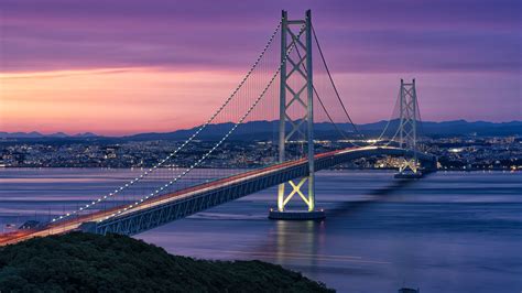 Japan Akashi Kaikyo Bridge With Background Of Purple Sky During Sunset