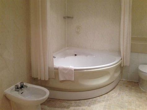This incredibly useful and compact tub is the perfect solution for small interiors. corner whirlpool tub shower combo - Google Search ...