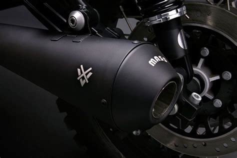 The Front Wheel Of A Motorcycle Is Shown In This Close Up Shot With