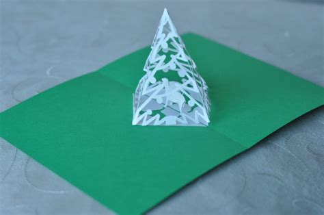 Simply line up the score line on the tree with the score line on the inside of the card. Complex Pyramid Christmas Tree Pop Up Card Template