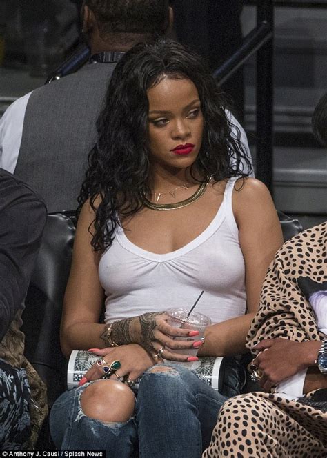 Rihanna Goes Braless In Semi Sheer Zebra Print Dress On Night Out