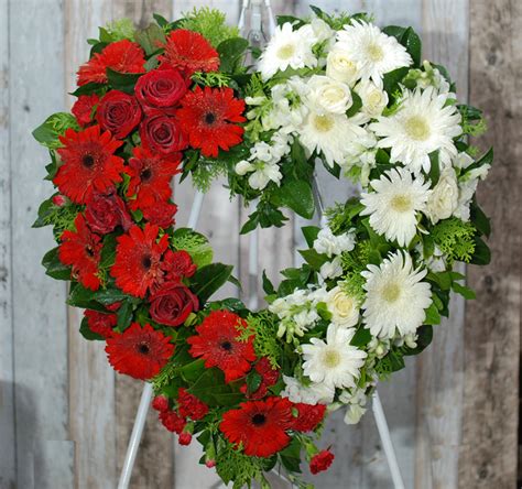 Although these roses are referred to as being black, they are in fact deep red or even dark purple. Funeral Flower Wreath- Always Be Red and White- WH34R ...