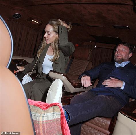 Jacqui Ainsley Plants A Kiss On Guy Ritchie As They Enjoy A Night Out Daily Mail Online
