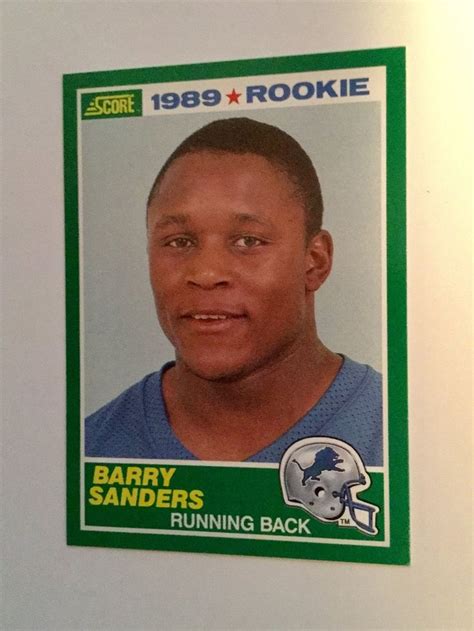 The value of this barry sanders rookie card is sure to rise. Barry Sanders Score football rookie card 1989 | Football cards, Sanders detroit, Football ...