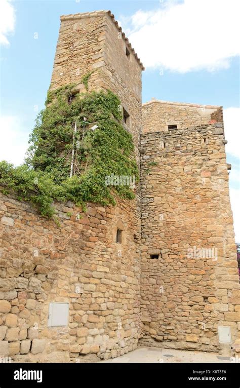 Stone Towers In The Medieval Village Of Peratallada Located In The