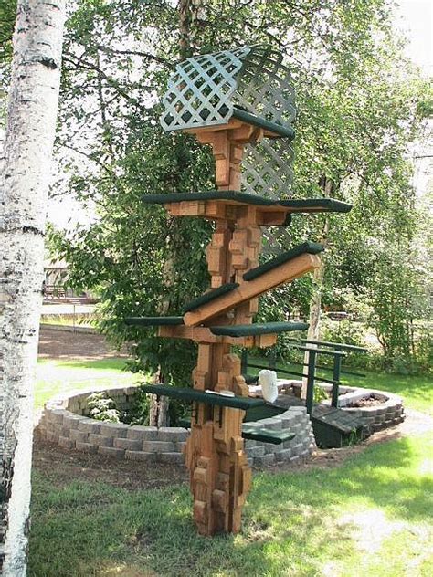 Some cats love going outside, some barely put a paw through the cat flap and others can't go out at all, so wherever your cat spends their time, make sure they're safe and happy. outdoor cat tree | Outdoor cat tree, Outdoor cats, Cat garden