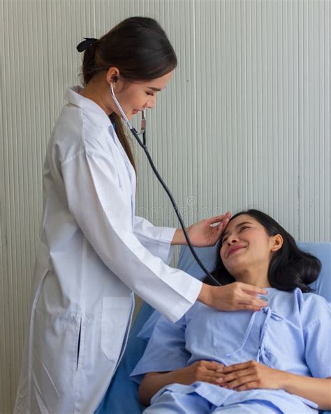 Female Doctor Checking Patient Using Stethoscope Stock Photo Image Of