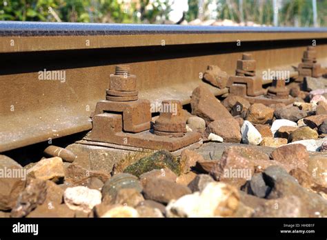 The Crushed Stones Or Ballast Alongside The Rail Track Hold The Wooden