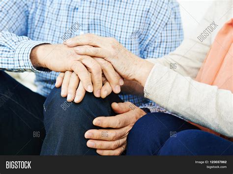 Senior Couple Holding Hands Home Image And Photo Bigstock