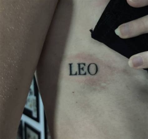 Leo Tattoo On Neck