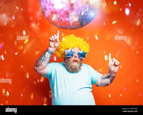 Man Dancing Under Disco Ball Stock Photo Alamy