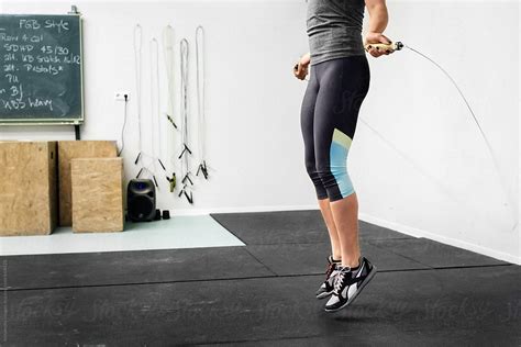 Woman Jumping Rope At Gym By Stocksy Contributor Minamoto Images