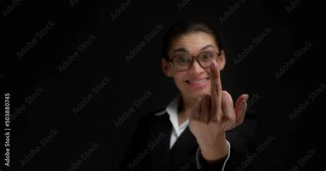 Guirky Business Woman In Glasses And Office Clothes Shows The Middle Finger Fuck You Fuck Off