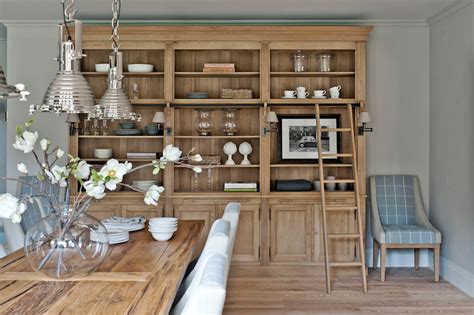 Example of a mountain style dining room design in chicago with beige walls if we don't do a built in for the dining room, we could do a feature wall behind the dining hutch. Dining Room with Built In Hutch - Traditional - Dining ...