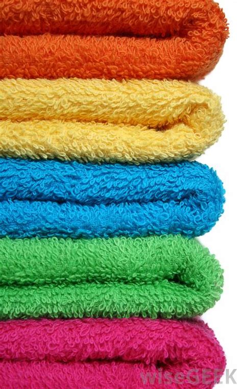 Dampen up to four, clean, colored towels with warm water. What is a Hand Towel? (with pictures)