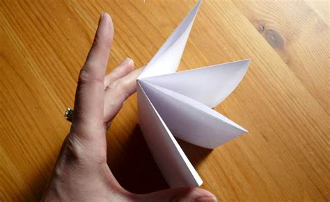 My kids learned how to make these books at school; How to Make an Origami Book | Brightly