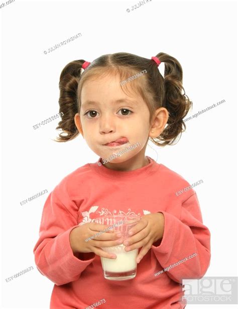 Cute Little Girl Drinking Milk Stock Photo Picture And Low Budget