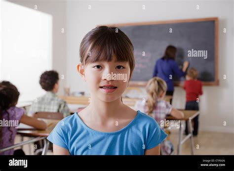 Usa California Los Angeles Portrait Of Schoolgirl In Classroom Stock