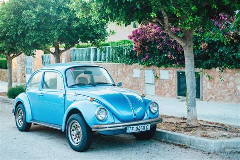 Blue Classic Car Parked On Side Of The Road · Free Stock Photo