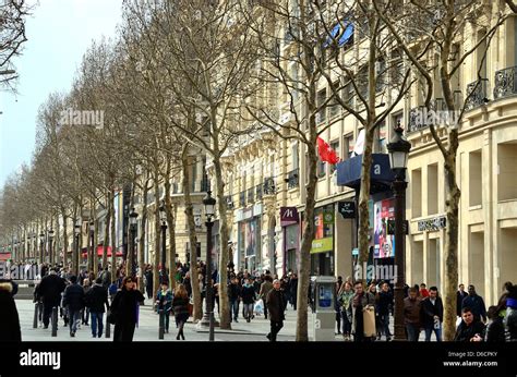 Shops And Crowds On The Champs Elysees Paris France Stock Photo Alamy