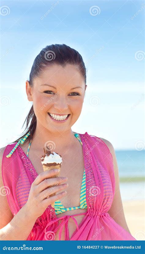 Glad Woman In Bikini Eating Ice Cream On The Beach Stock My Xxx Hot Girl