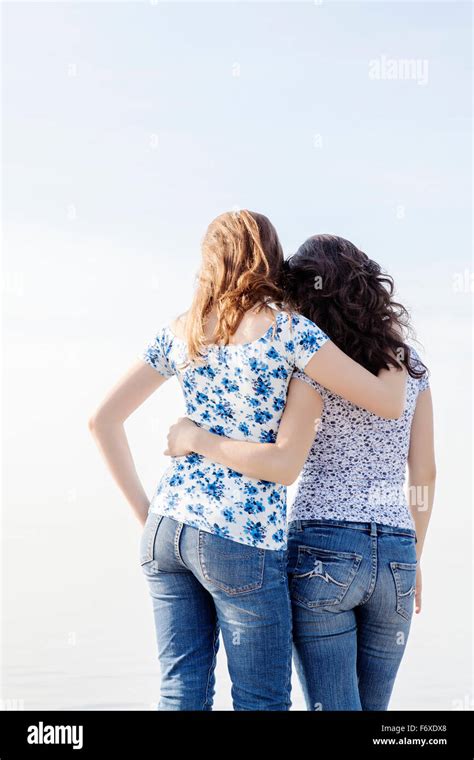 Two Girls With Their Arms Around Each Other Toronto Ontario Canada Stock Photo Alamy