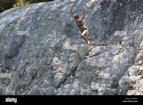 Girl Jumping Off Cliff Hi Res Stock Photography And Images Alamy