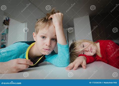 Sad And Stressed Boy And Girl At Home Stock Photo Image Of Misery