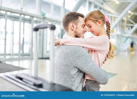 Father And Daughter Hug Each Other In Greeting Stock Photo Image Of