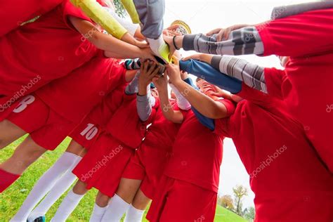 Kids Soccer Team In Huddle Stock Photo By ©fotokostic 129634556