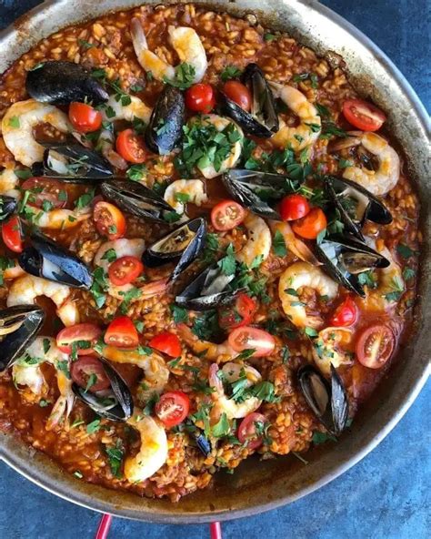 authentic seafood paella recipe with saffron hip foodie mom