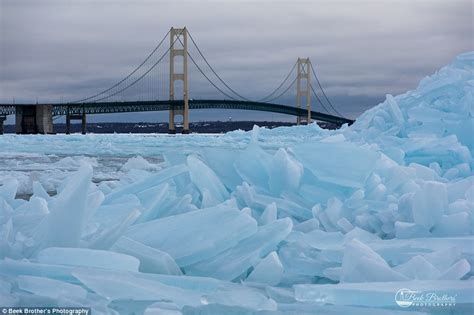 Lake Huron Photographs Show Sky Blue Ice Stacking Up Along The Shore