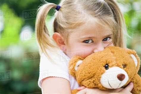 Girl Hugging Teddy Bear Telegraph