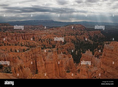 Sun Rays Coming Through On A Cloudy Day In Bryce Canyon Stock Photo Alamy