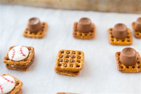 Some Waffles With Chocolate And Baseball Decorations On Them Sitting On