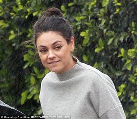 Mila Kunis Braves La Rain In Turtleneck Sweatshirt Daily Mail Online