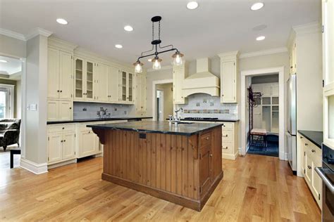 Cream kitchen cabinets dark floors. 23 Reclaimed Wood Kitchen Islands (Pictures) - Designing Idea
