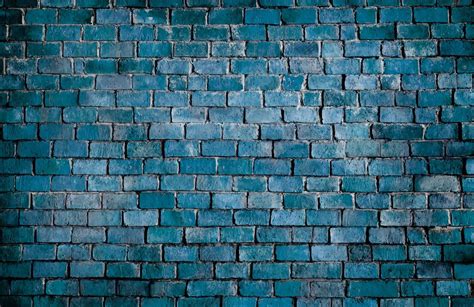 A Blue Brick Wall That Is Very Dark