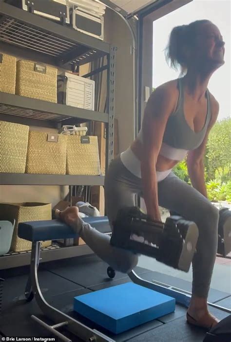 Brie Larson Shares Another Punishing Workout As She Flexes Her Muscles Doing Weights At Home