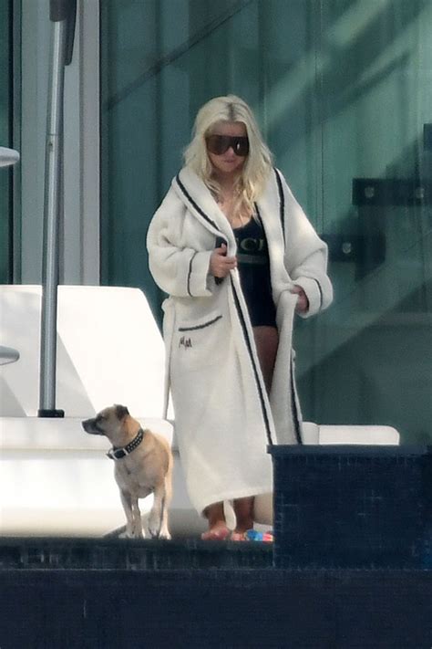 Christina Aguilera Stuns In Gucci Swimsuit While In Miami — Pics