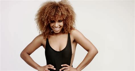 Black Mixed Race Woman With Perfect Smile And Big Afro Hair Dancing
