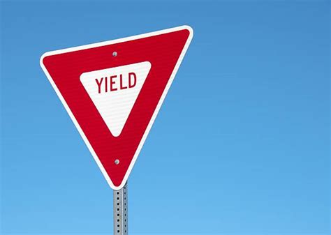 Royalty Free Yield Sign Pictures Images And Stock Photos Istock