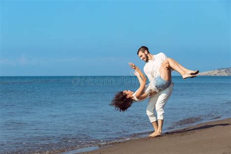 Romance On Vacation Couple In Love On The Beach Flirting Stock Image