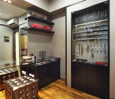 Try adding velvet and acrylic organizers to your closet drawers as a way to keep jewelry. Innovative mirrored jewelry armoire in Closet Contemporary ...