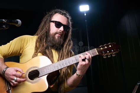 Guitarist Man Plays An Acoustic Guitar Close Up At Studio Stock Photo Image Of Performing