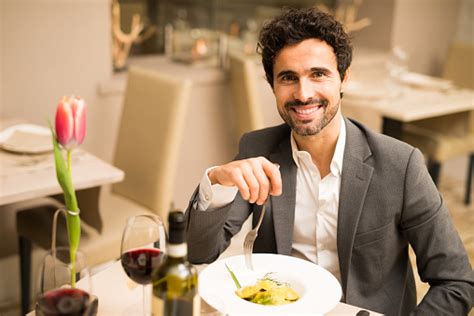 Man Eating In A Restaurant Stock Photo Download Image Now Istock