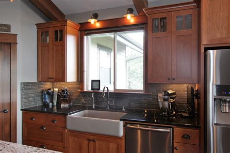 Raised panel cabinet doors showcase a carved framework that surrounds a floating, center panel. Affordable Custom Cabinets - Showroom