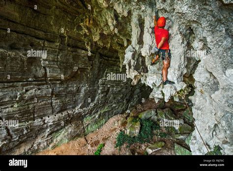 Rear View Of Male Climber At Treasure Cave In Yangshuo Guangxi Zhuang
